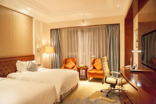 Imagen de la habitación del Hotel Glory Charm. Foto 8