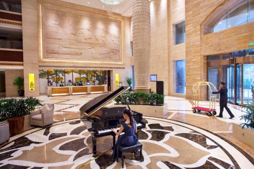 Imagen de la habitación del Hotel Glory Charm. Foto 10