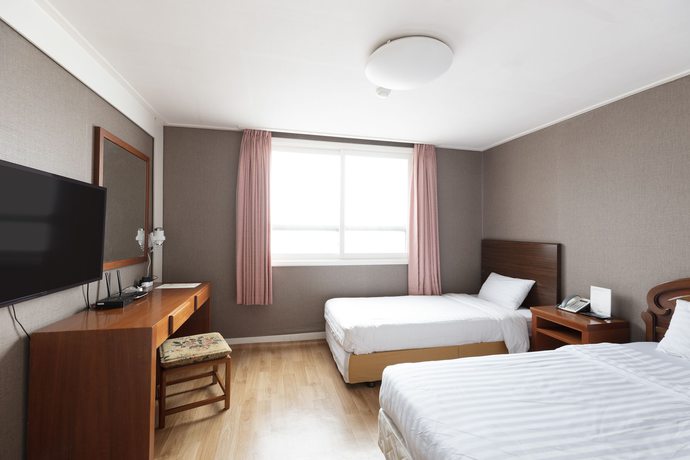 Imagen de la habitación del Hotel Glory Condo Haeundae. Foto 12