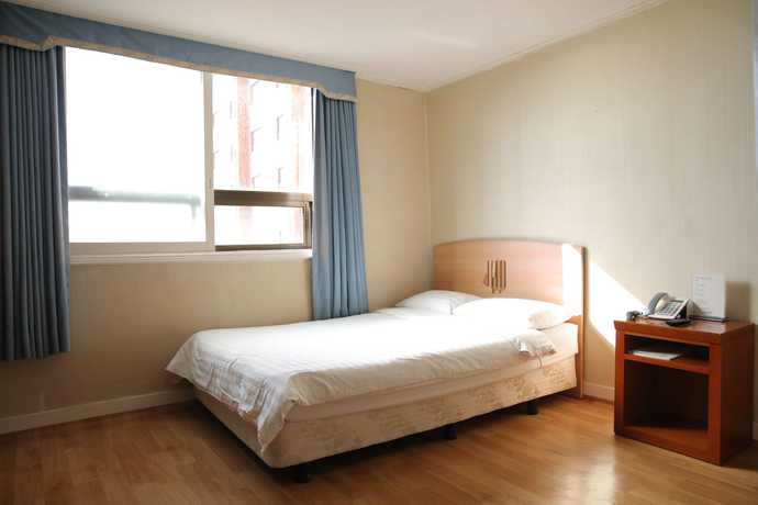 Imagen de la habitación del Hotel Glory Condo Haeundae. Foto 17