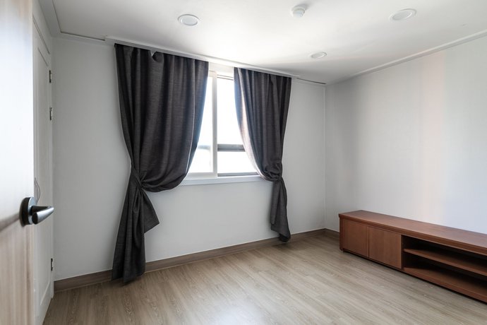 Imagen de la habitación del Hotel Glory Condo Haeundae. Foto 18