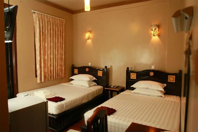 Imagen de la habitación del Hotel Glory. Foto 18