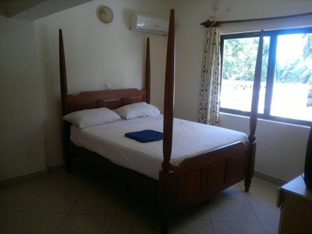 Imagen de la habitación del Hotel Glory Holiday Resort. Foto 7