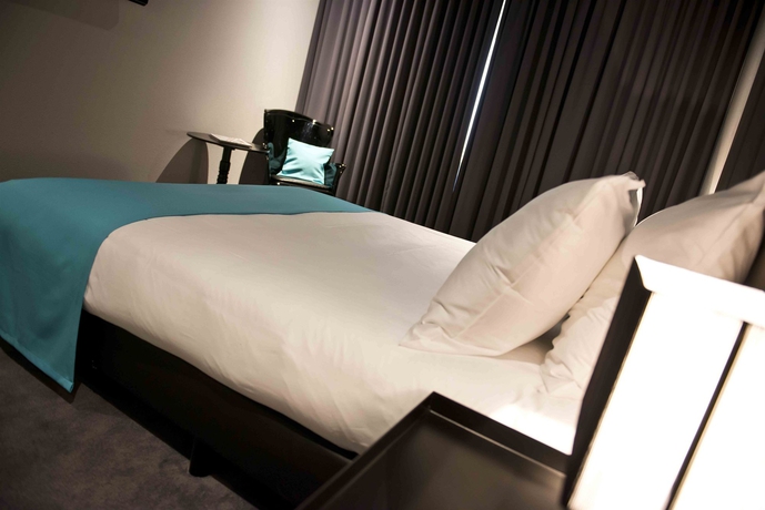 Imagen de la habitación del Hotel Glow. Foto 10