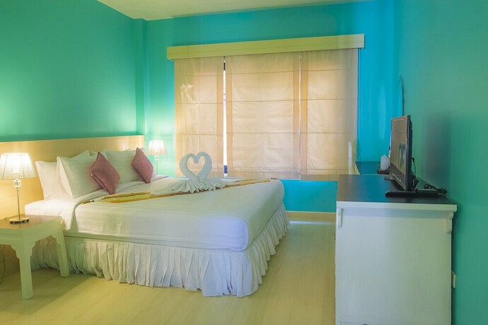 Imagen de la habitación del Hotel Glur Chiangmai. Foto 11