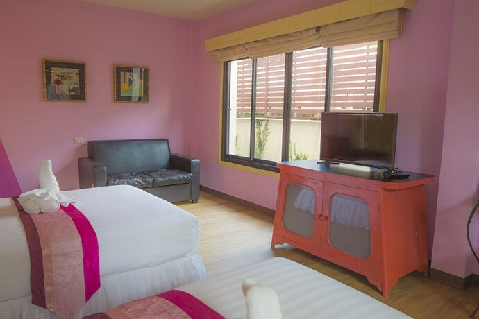 Imagen de la habitación del Hotel Glur Chiangmai. Foto 24