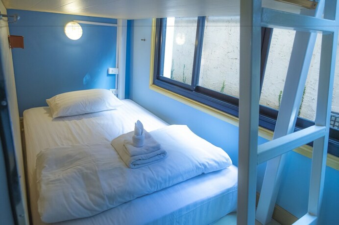 Imagen de la habitación del Hotel Glur Chiangmai. Foto 31