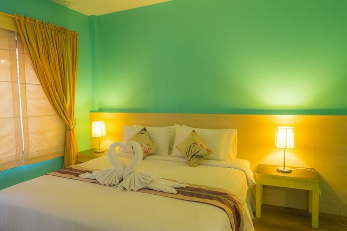 Imagen de la habitación del Hotel Glur Chiangmai. Foto 33