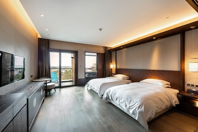 Imagen de la habitación del Hotel G-luxe By Gloria Suzhou Taimei. Foto 20