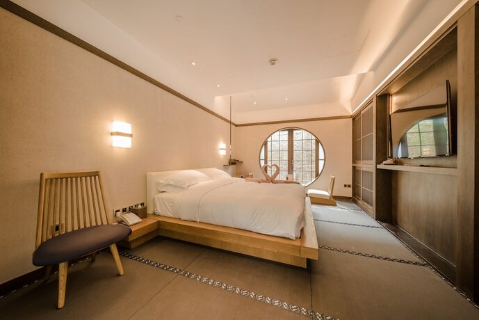 Imagen de la habitación del Hotel G-luxe By Gloria Suzhou Taimei. Foto 22