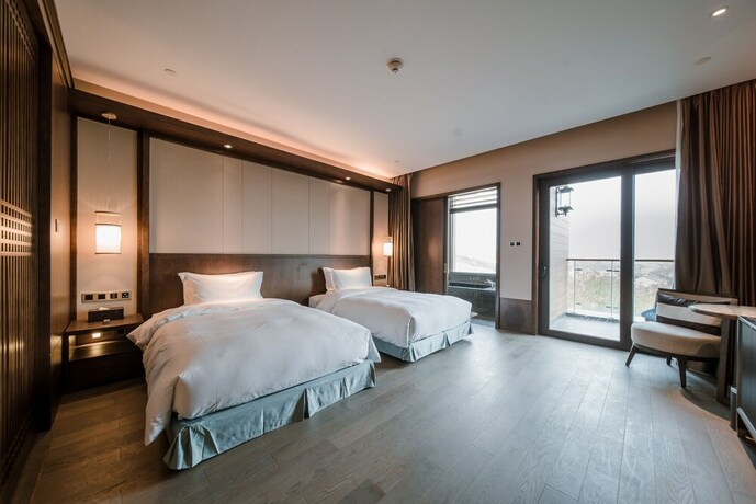 Imagen de la habitación del Hotel G-luxe By Gloria Suzhou Taimei. Foto 27
