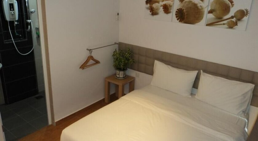 Imagen de la habitación del Hotel Gm City. Foto 18