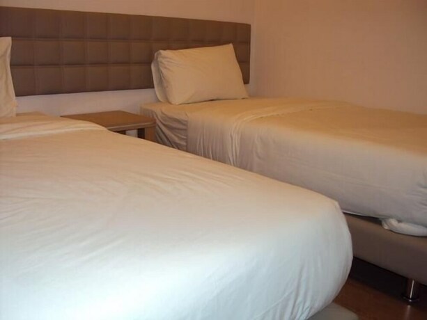 Imagen de la habitación del Hotel Gm City. Foto 19