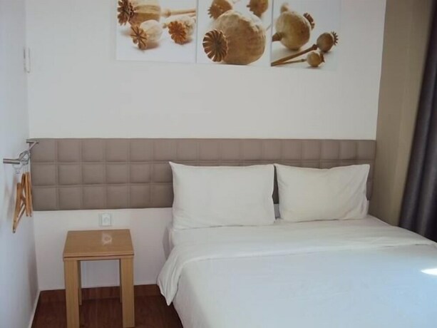 Imagen de la habitación del Hotel Gm City. Foto 23