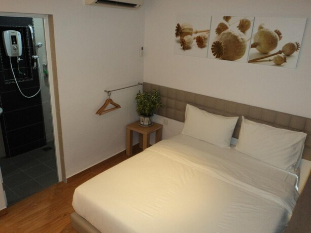 Imagen de la habitación del Hotel Gm City. Foto 26