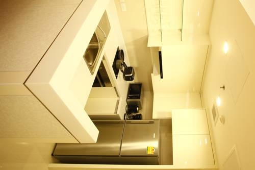 Imagen de la habitación del Hotel Gm Serviced Apartment. Foto 29