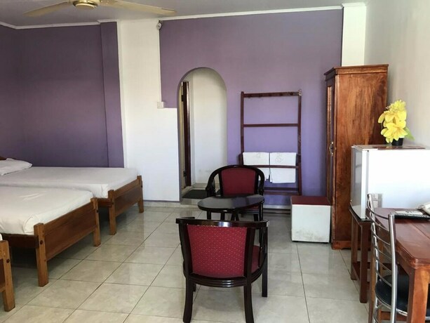 Imagen de la habitación del Hotel Gnanams. Foto 14