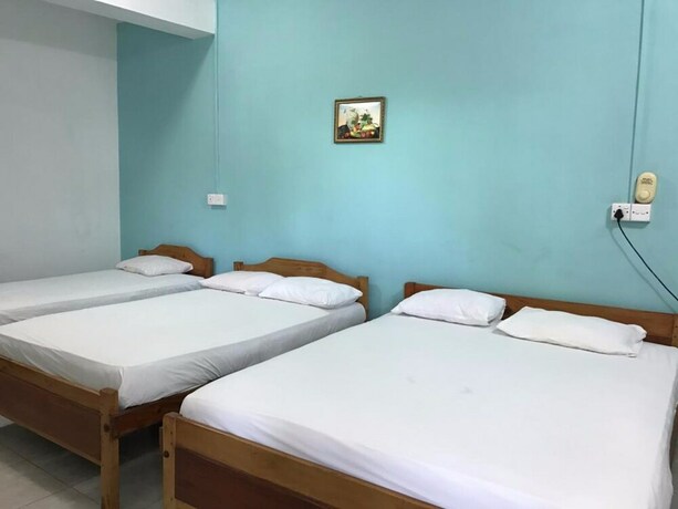 Imagen de la habitación del Hotel Gnanams. Foto 15