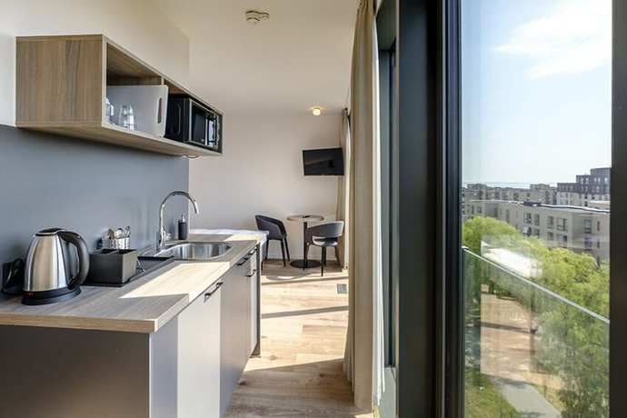 Imagen de la habitación del Hotel Go Hotel City. Foto 10