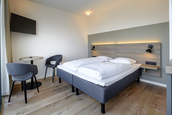 Imagen de la habitación del Hotel Go Hotel City. Foto 11