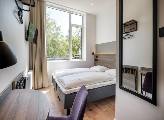 Imagen de la habitación del Hotel Go Hotel City. Foto 12