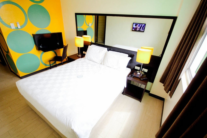 Imagen de la habitación del Hotel Go Hotels Puerto Princesa. Foto 2