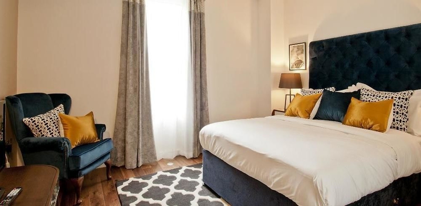 Imagen de la habitación del Hotel Go Native Monument. Foto 10