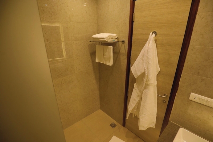Imagen de la habitación del Hotel Goa Country Club By Pearl Near Udyog vihar Yashobhoomi. Foto 7