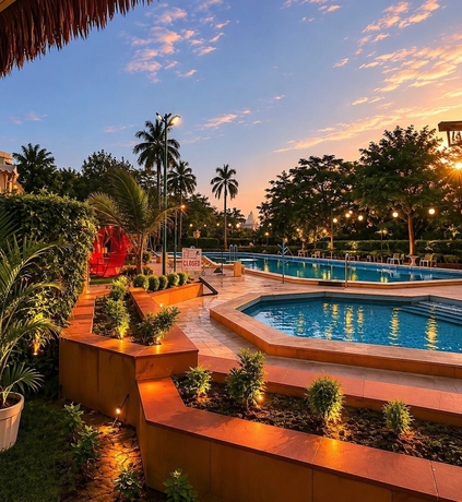 Imagen de la piscina del Hotel Goa Country Club By Pearl Near Udyog vihar Yashobhoomi. Foto 16