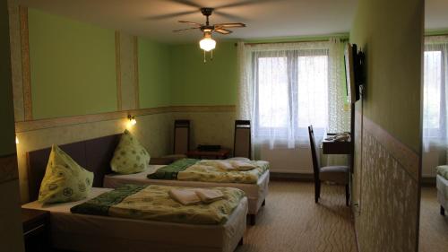 Imagen de la habitación del Hotel Gościniec Willa Sandra. Foto 7
