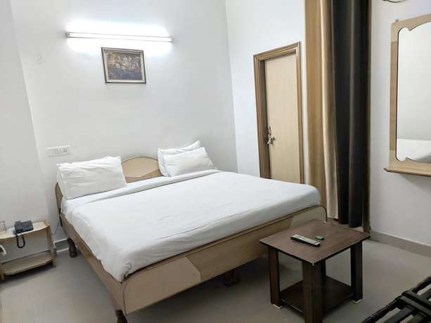 Imagen de la habitación del Hotel God Gift. Foto 4