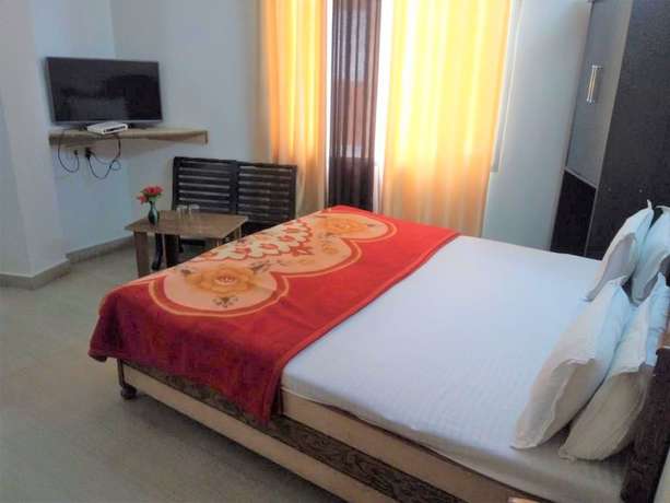 Imagen de la habitación del Hotel God Gift. Foto 7