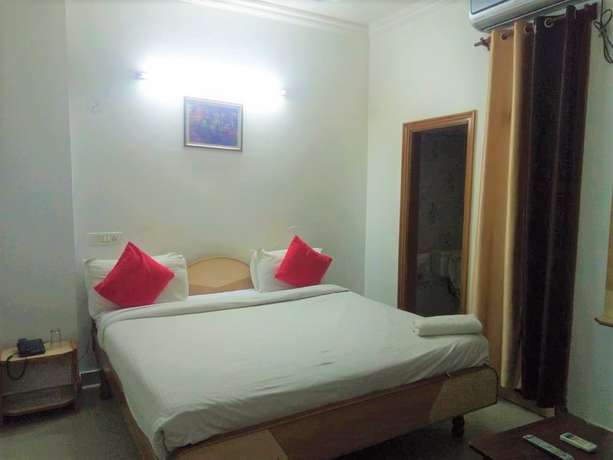 Imagen de la habitación del Hotel God Gift. Foto 8