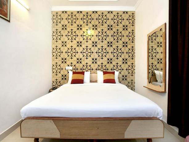 Imagen de la habitación del Hotel God Gift. Foto 9
