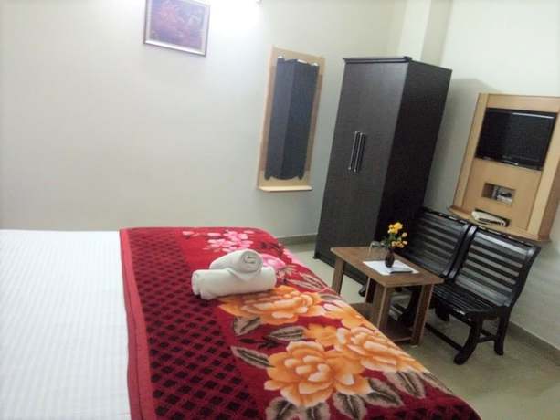 Imagen de la habitación del Hotel God Gift. Foto 10