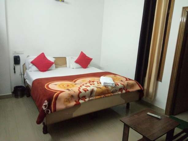 Imagen de la habitación del Hotel God Gift. Foto 11