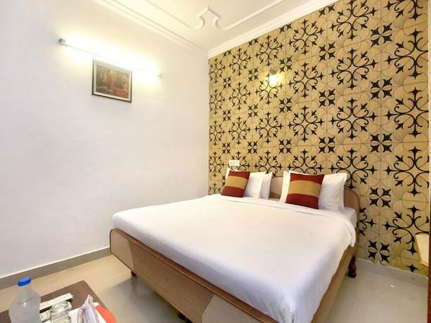 Imagen de la habitación del Hotel God Gift. Foto 13