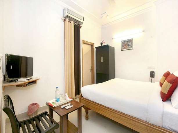 Imagen de la habitación del Hotel God Gift. Foto 15