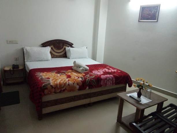 Imagen de la habitación del Hotel God Gift. Foto 16