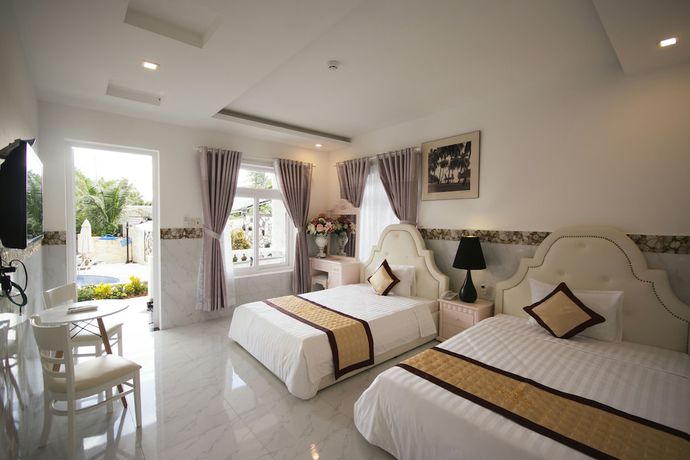 Imagen de la habitación del Hotel Godiva Phu Quoc. Foto 2