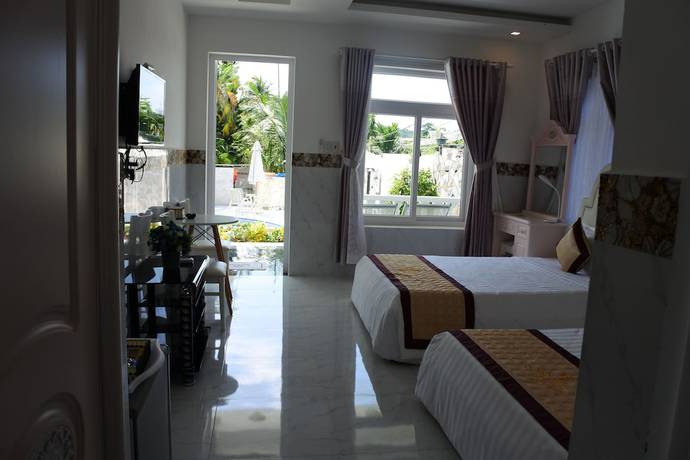 Imagen de la habitación del Hotel Godiva Phu Quoc. Foto 5