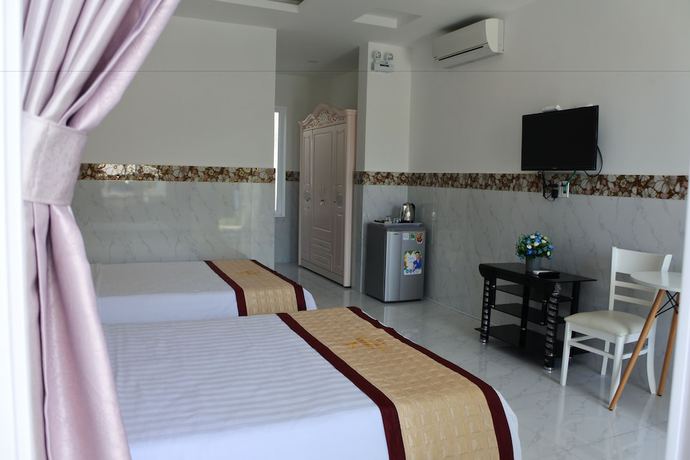 Imagen de la habitación del Hotel Godiva Phu Quoc. Foto 11