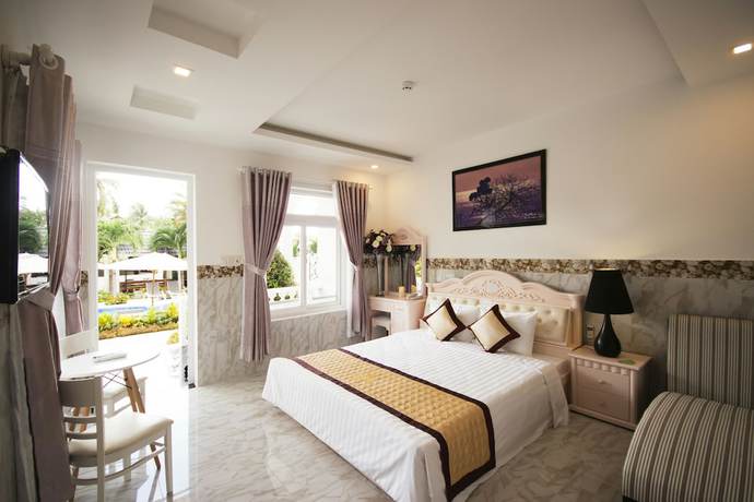 Imagen de la habitación del Hotel Godiva Phu Quoc. Foto 12