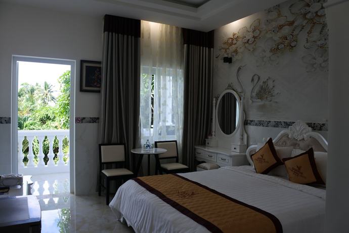 Imagen de la habitación del Hotel Godiva Phu Quoc. Foto 15