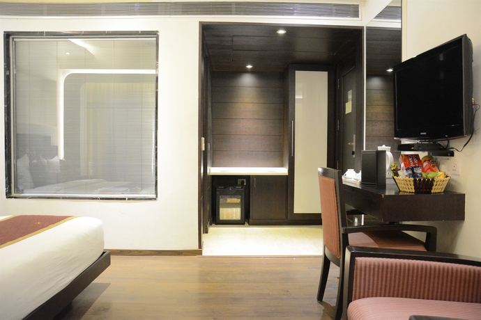 Imagen de la habitación del Hotel Godwin Deluxe. Foto 8