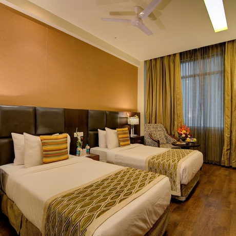 Imagen de la habitación del Hotel Godwin Haridwar. Foto 2