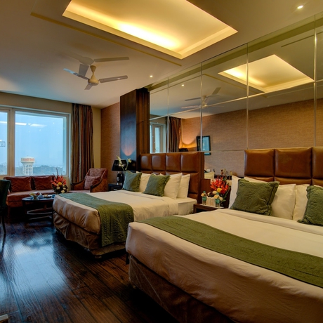 Imagen de la habitación del Hotel Godwin Haridwar. Foto 14