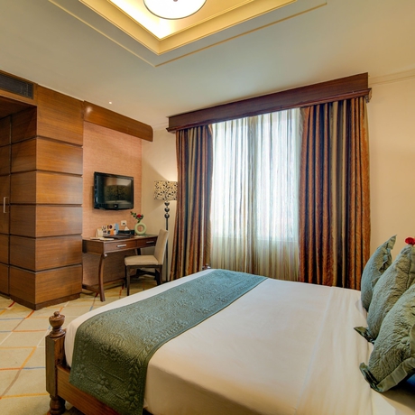 Imagen de la habitación del Hotel Godwin Haridwar. Foto 17