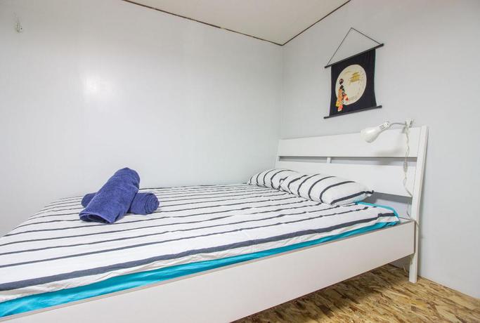 Imagen de la habitación del Hotel Gojo Paradiso Homes. Foto 9