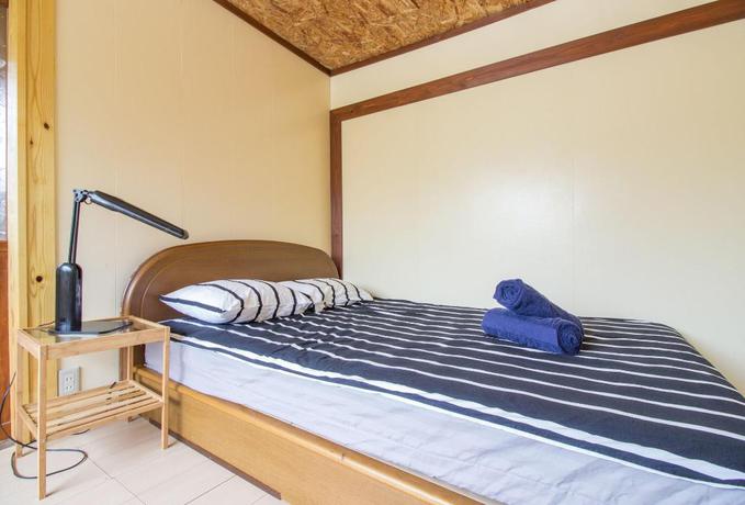 Imagen de la habitación del Hotel Gojo Paradiso Homes. Foto 11